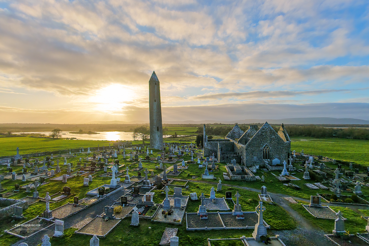 Kilmacduagh Monastery Burren Clare Ireland - cemetary,church,drone,february,golden,kilmacduagh,landmark,sunset,tower,winter,lowlands