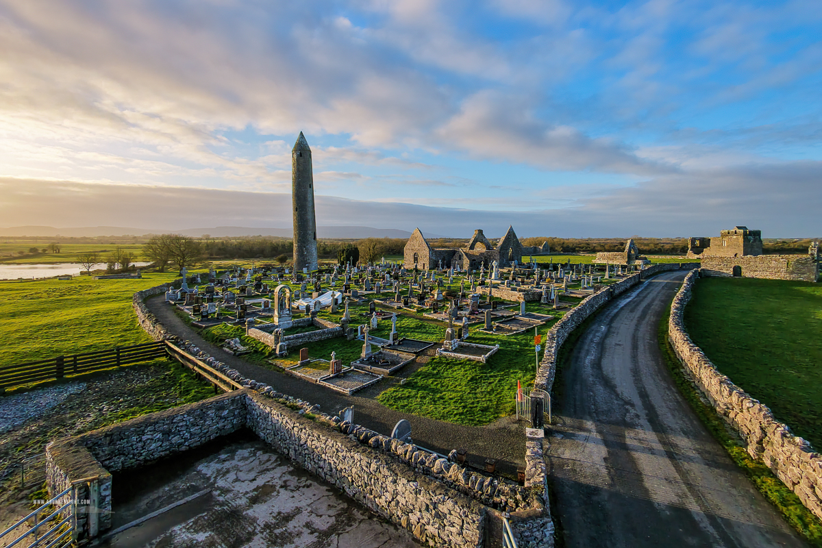 Kilmacduagh Monastery Burren Clare Ireland - cemetary,church,drone,february,golden,kilmacduagh,landmark,sunset,tower,winter,lowlands
