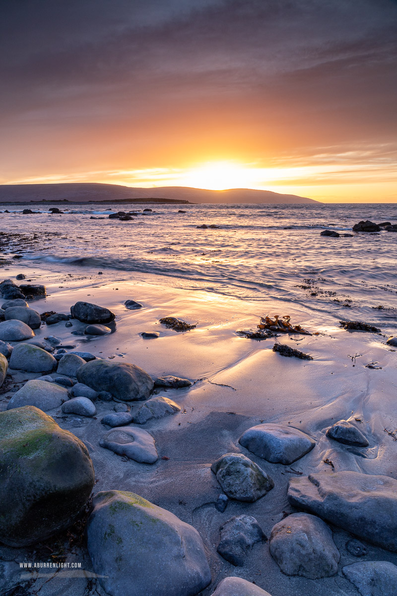 The Flaggy Shore Kinvara Wild Atlantic Way Clare Ireland - boulder,dusk,flaggy shore,golden,march,orange,sunset,winter,coast