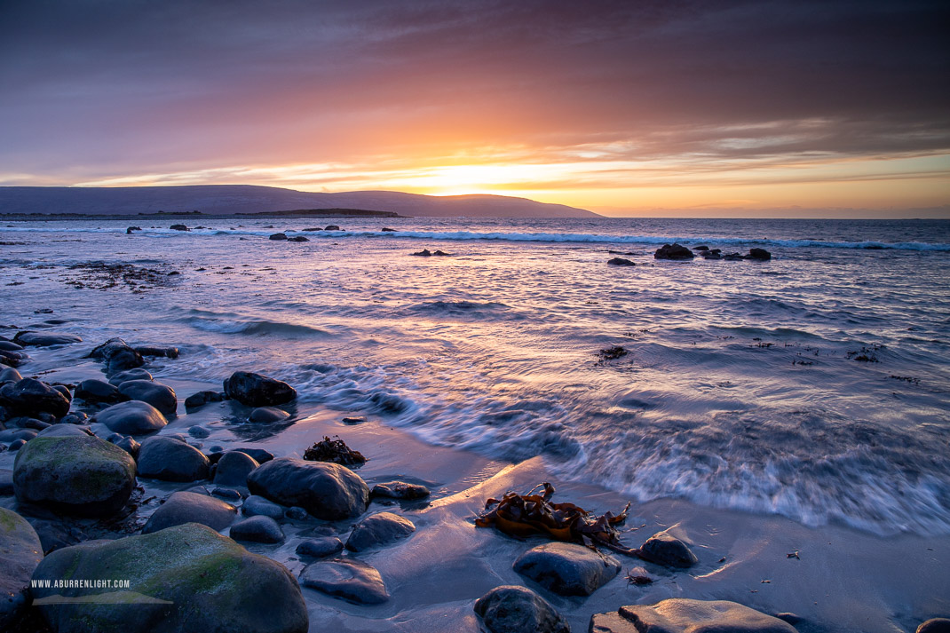 The Flaggy Shore Kinvara Wild Atlantic Way Clare Ireland - boulder,dusk,flaggy shore,golden,march,orange,sunset,winter,coast