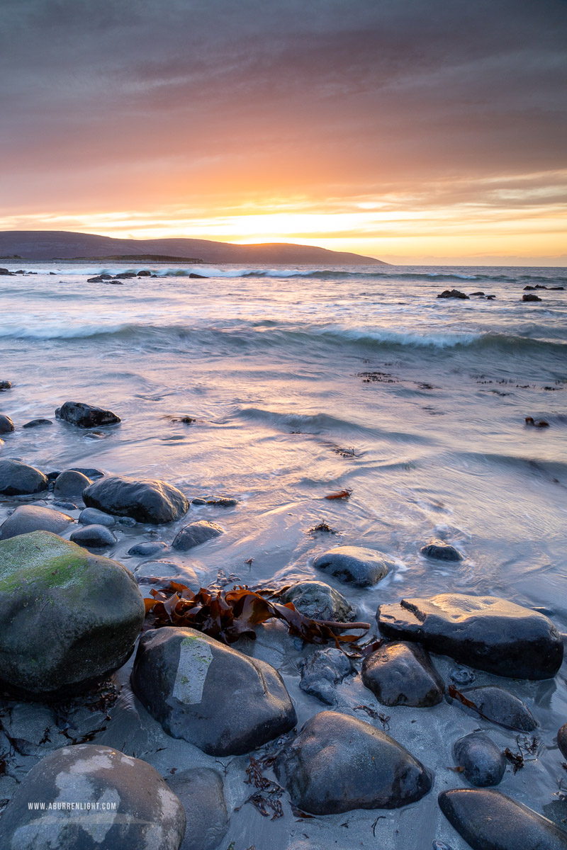 The Flaggy Shore Kinvara Wild Atlantic Way Clare Ireland - boulder,dusk,flaggy shore,golden,march,orange,sunset,winter,coast